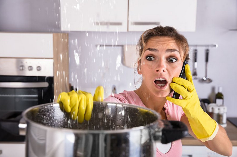woman calling an emergency plumber in sydney to fix dripping water